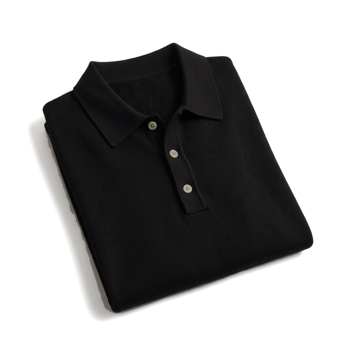 Veglia Polo in Schwarz, gefaltet